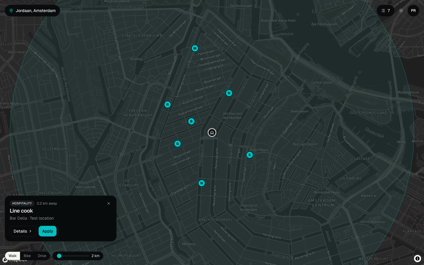 Workee map over Amsterdam in dark mode — commute-radius ring, job pins with company initials, job card open